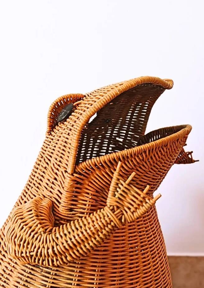 Vintage frog magazine rack in woven wicker design by Olivier Cajan