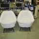 Pair of Mid-Century armchairs in white faux fur with beech legs.