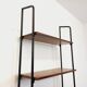 Vintage Italian modular shelving unit in teak and metal from the 1970s