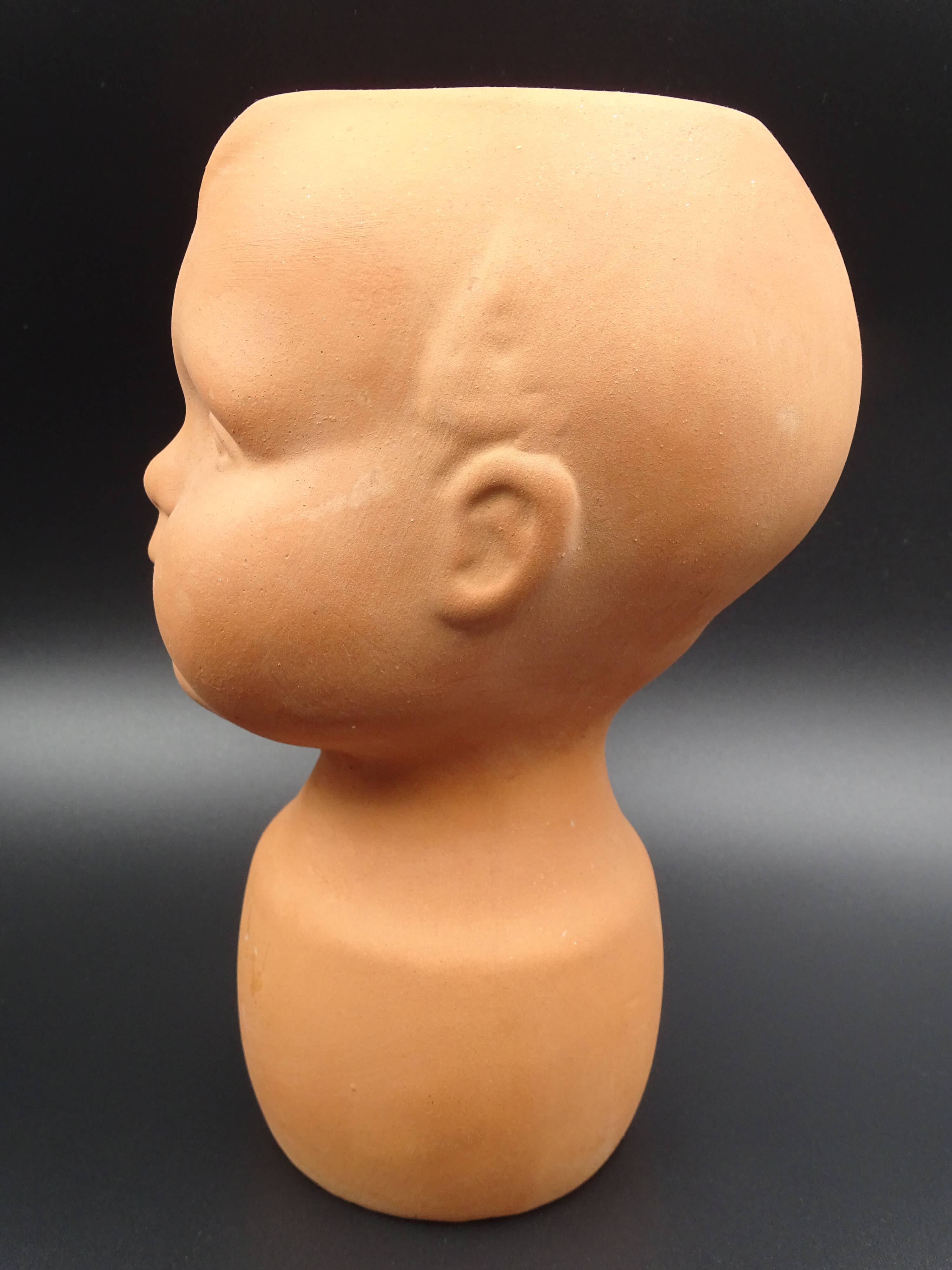 Vase in the shape of a baby's head - poupon