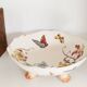 Fruit bowl with polychrome design in Lunéville earthenware, round dish