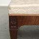 Antique French sofa from the 19th century in Empire style with a silk seat