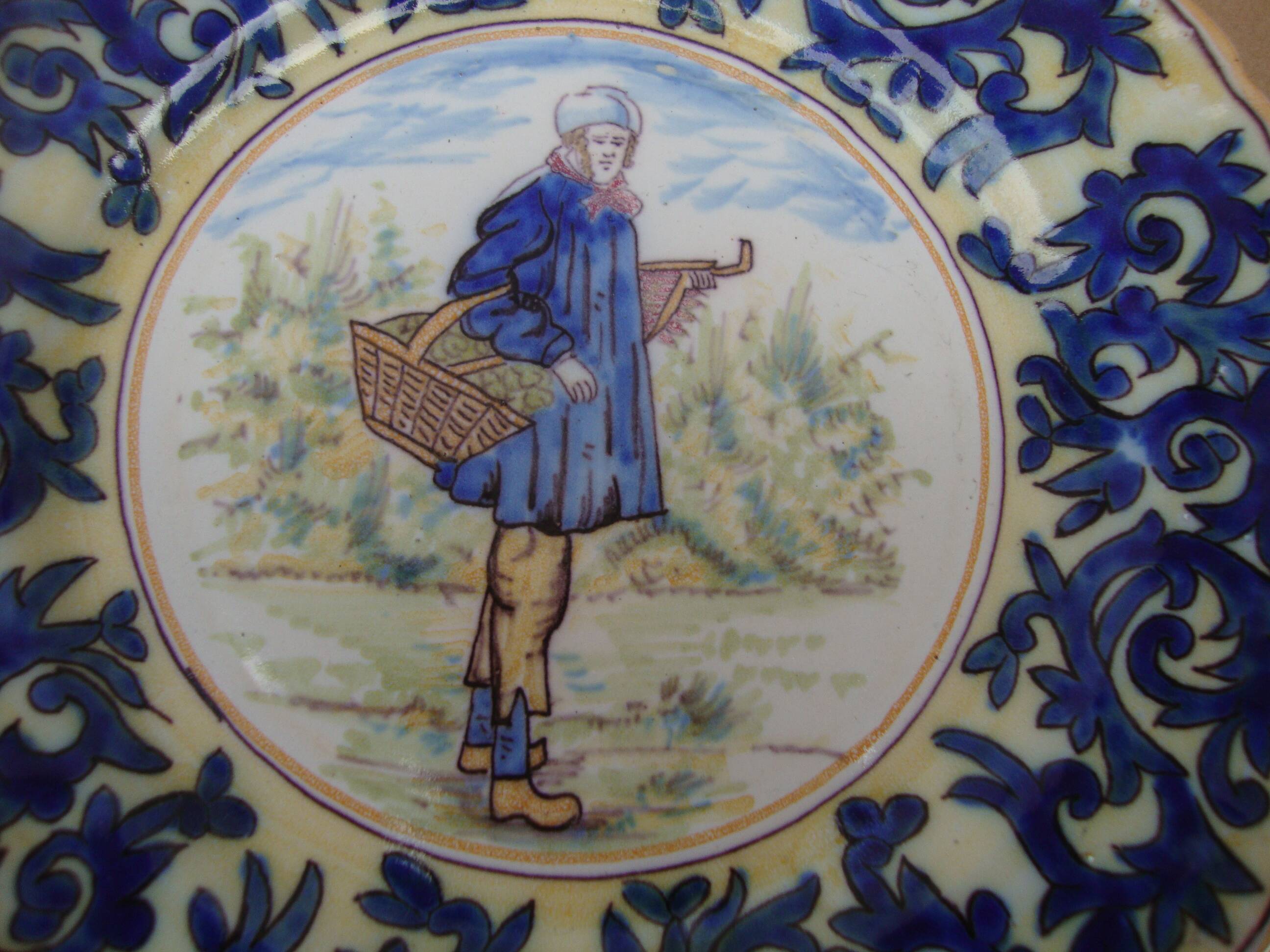 Old earthenware plate decorated with a character marked Le HAVRE