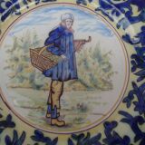 Old earthenware plate decorated with a character marked Le HAVRE