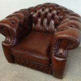 Curved brown leather chesterfield armchair