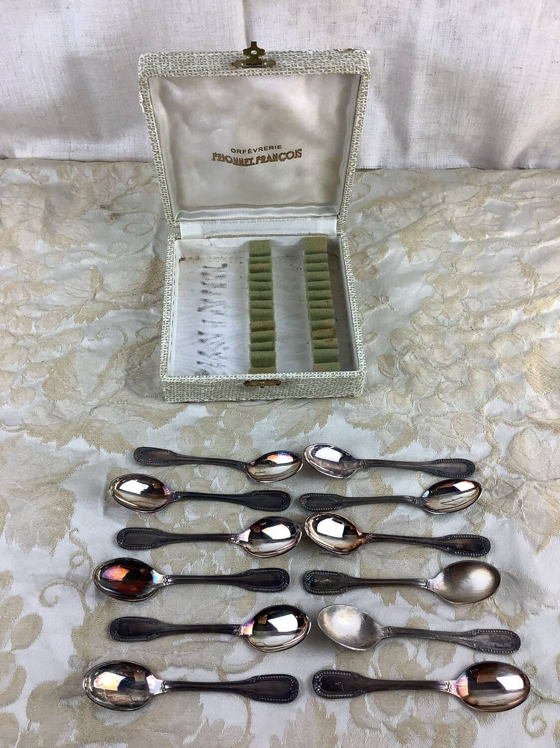 Box of 12 old spoons