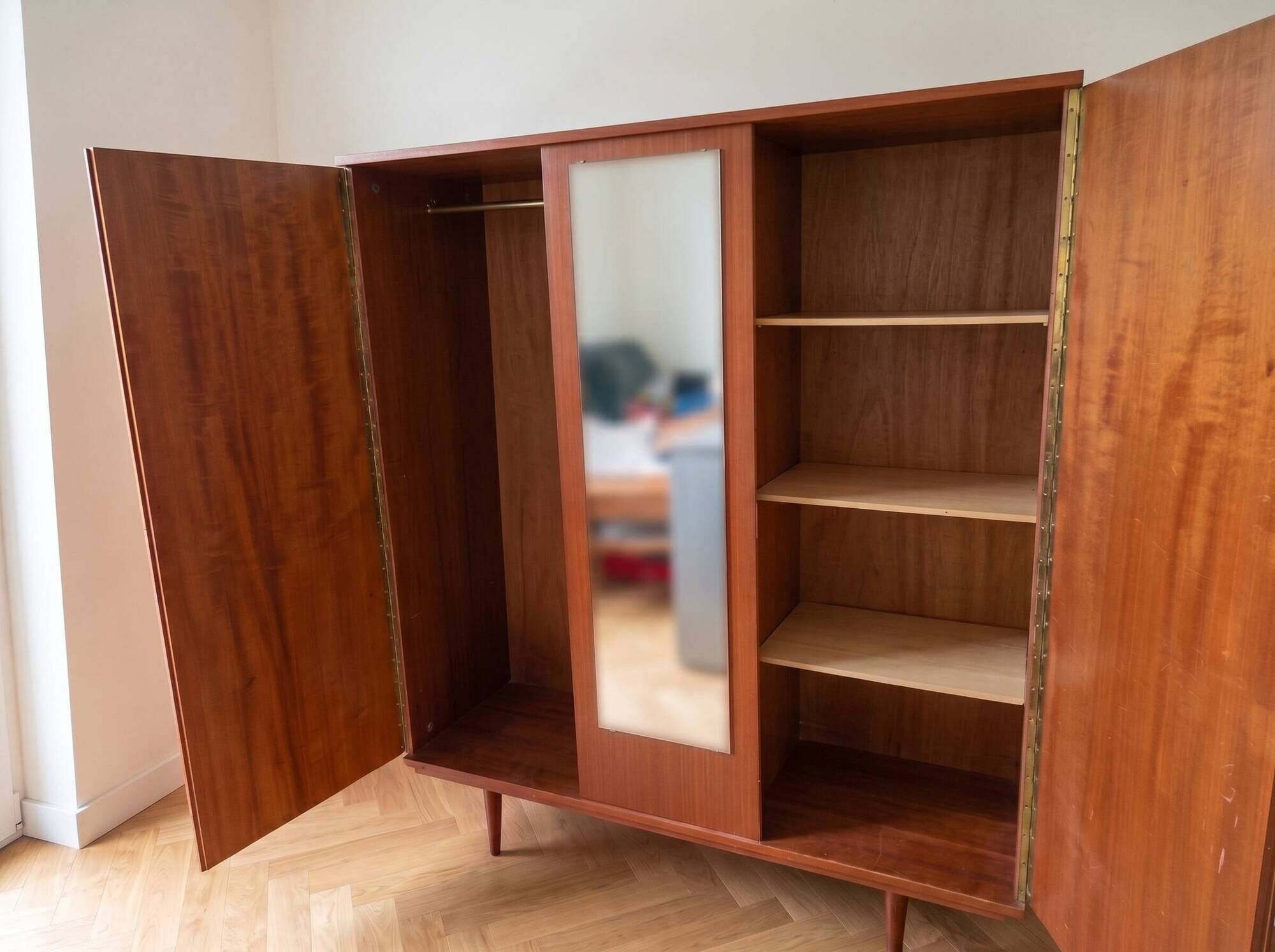 Vintage 1950s wooden wardrobe with mirror.