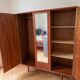 Vintage 1950s wooden wardrobe with mirror.