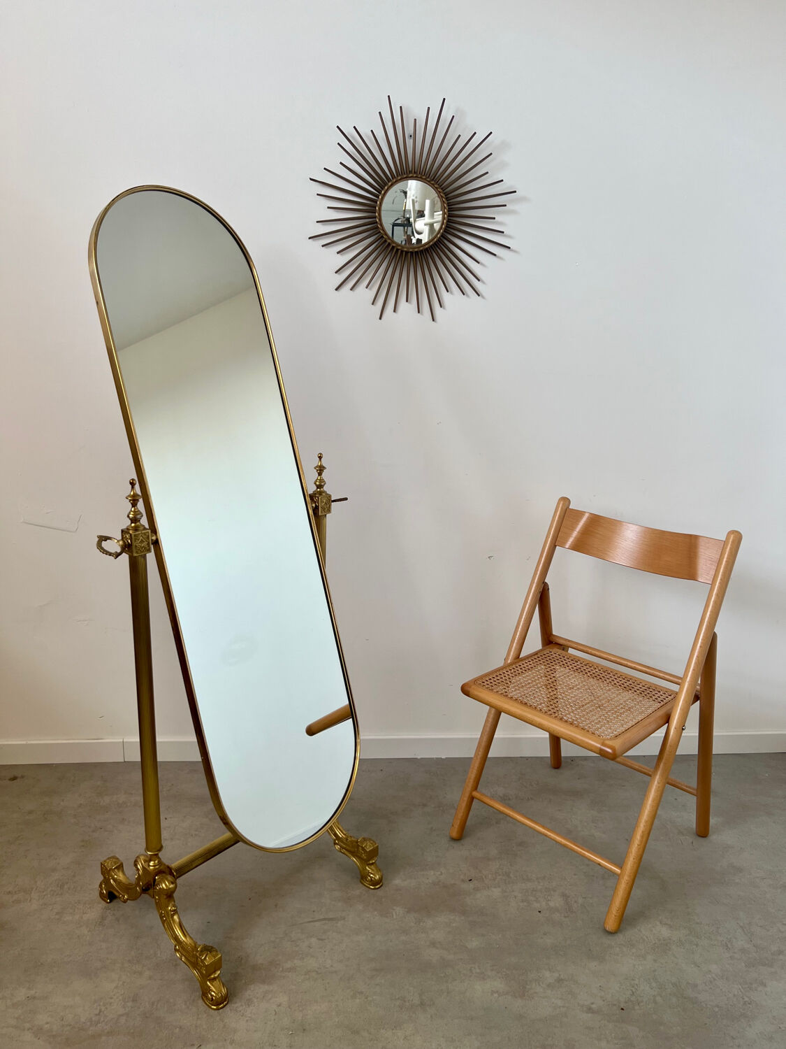 Old free-standing mirror in gilded brass in psychedelic neoclassical style Years 40 France