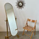 Old free-standing mirror in gilded brass in psychedelic neoclassical style Years 40 France