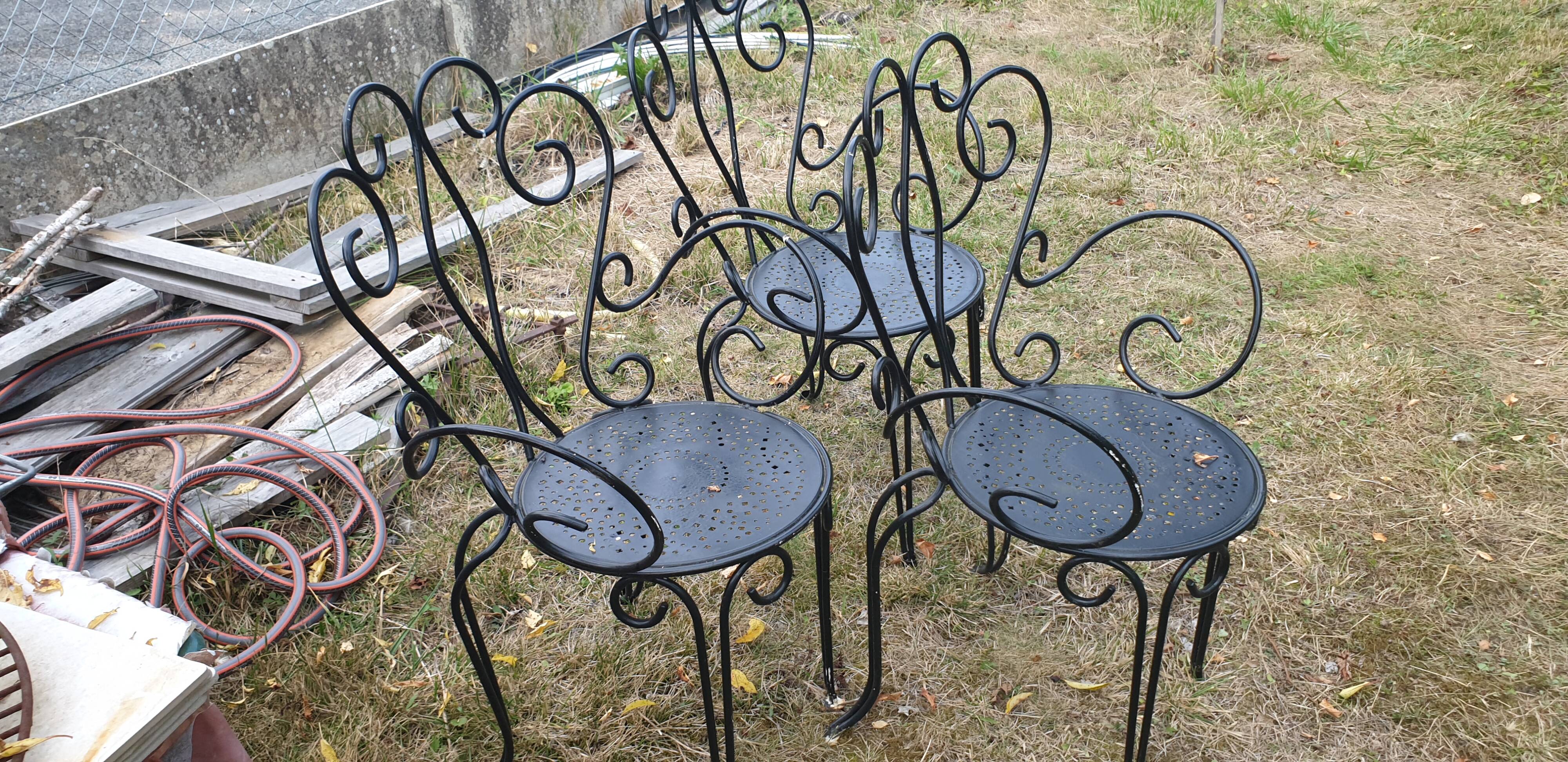 3 ornate wrought iron garden armchairs