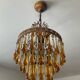 Vintage chandeliers with amber glass tassels and drops