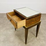 Art Deco mirror and brass bedside table