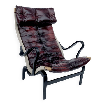 Fauteuil vintage Pernilla 69 de Bruno Mathsson pour Dux en cuir sang de bœuf