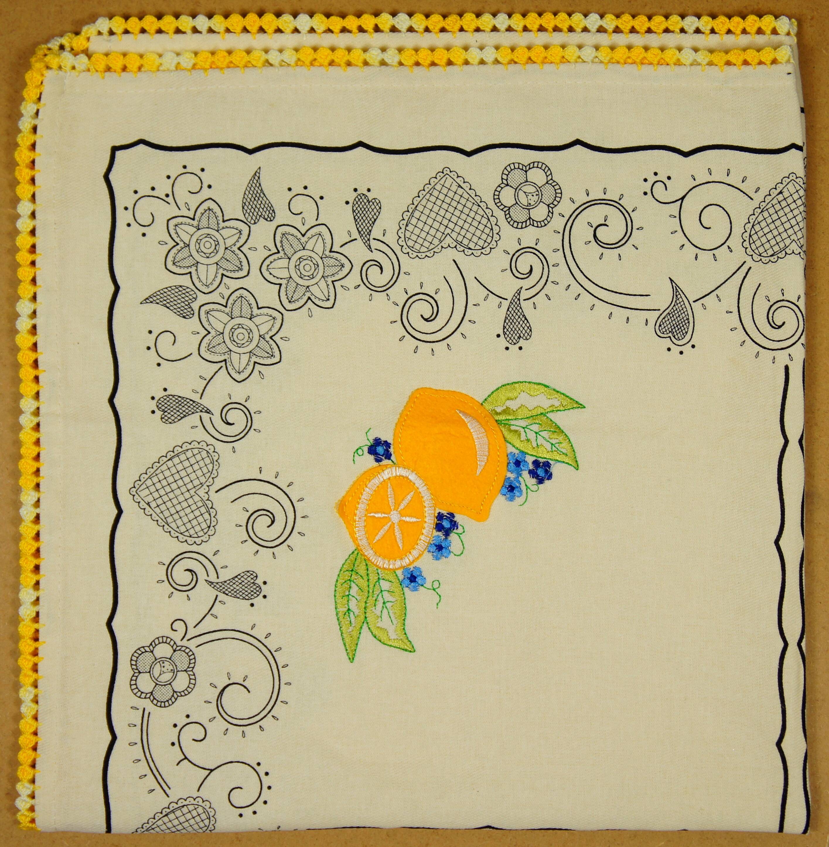Old cloth embroidered "lemons"