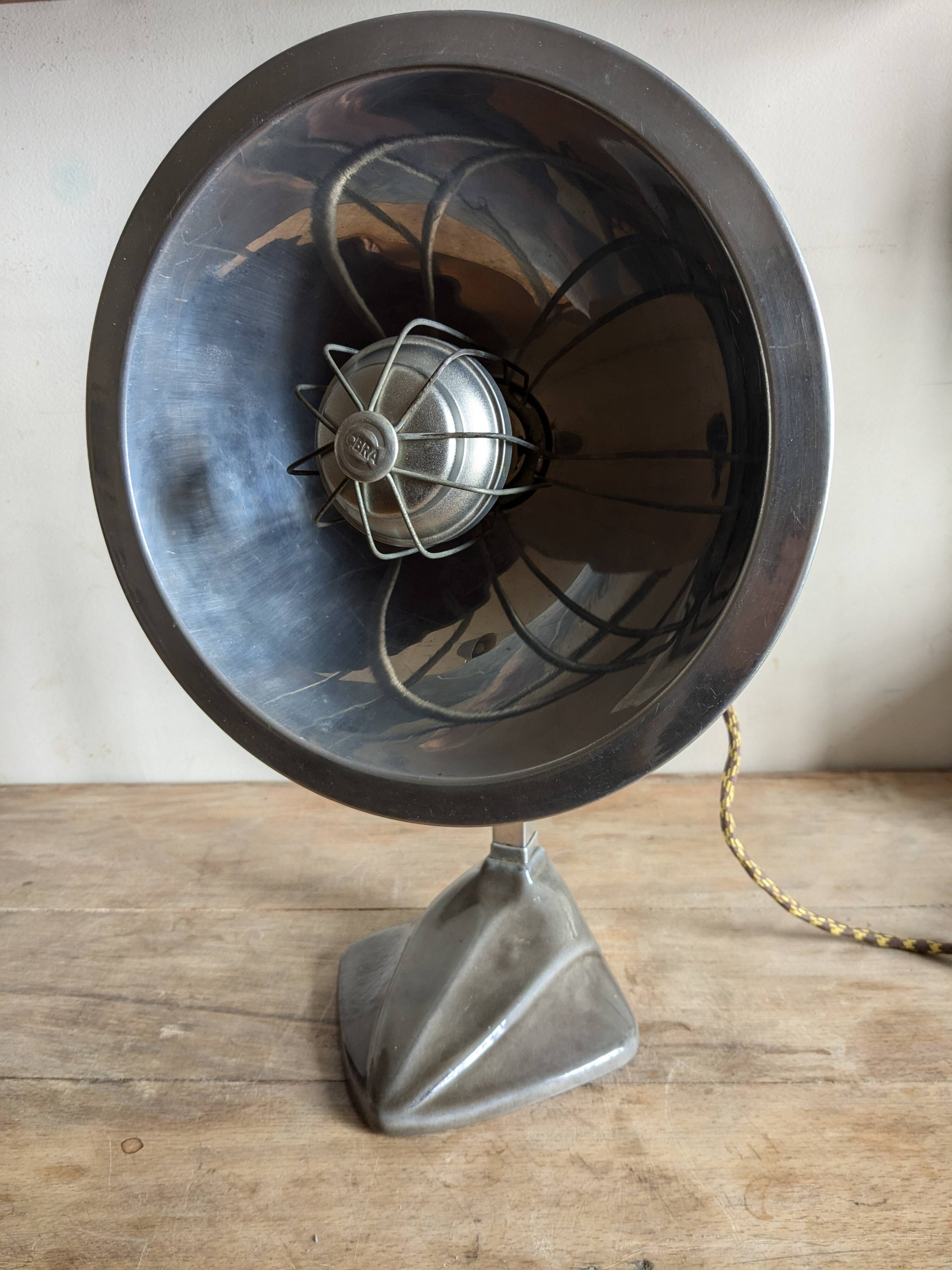 Cobra parabolic lamp with enameled cast iron base, Art Nouveau.
