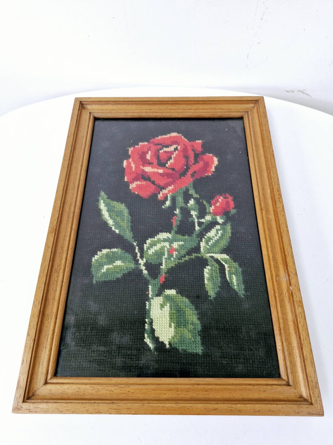 Canvas under vintage pink frame on black background