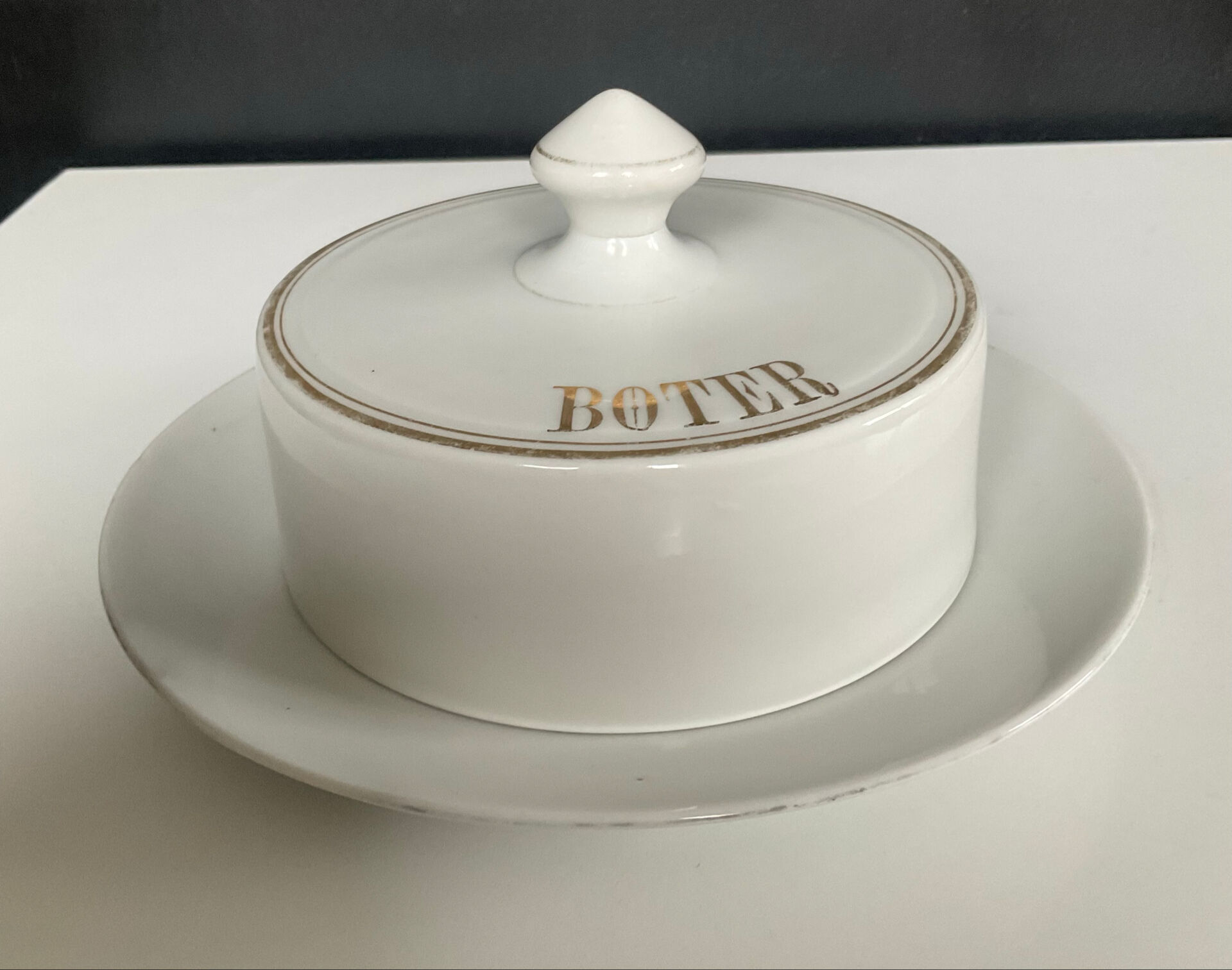 Vintage butter dish in enamelled porcelain