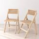 Paire de chaises pliantes en cannage et bois