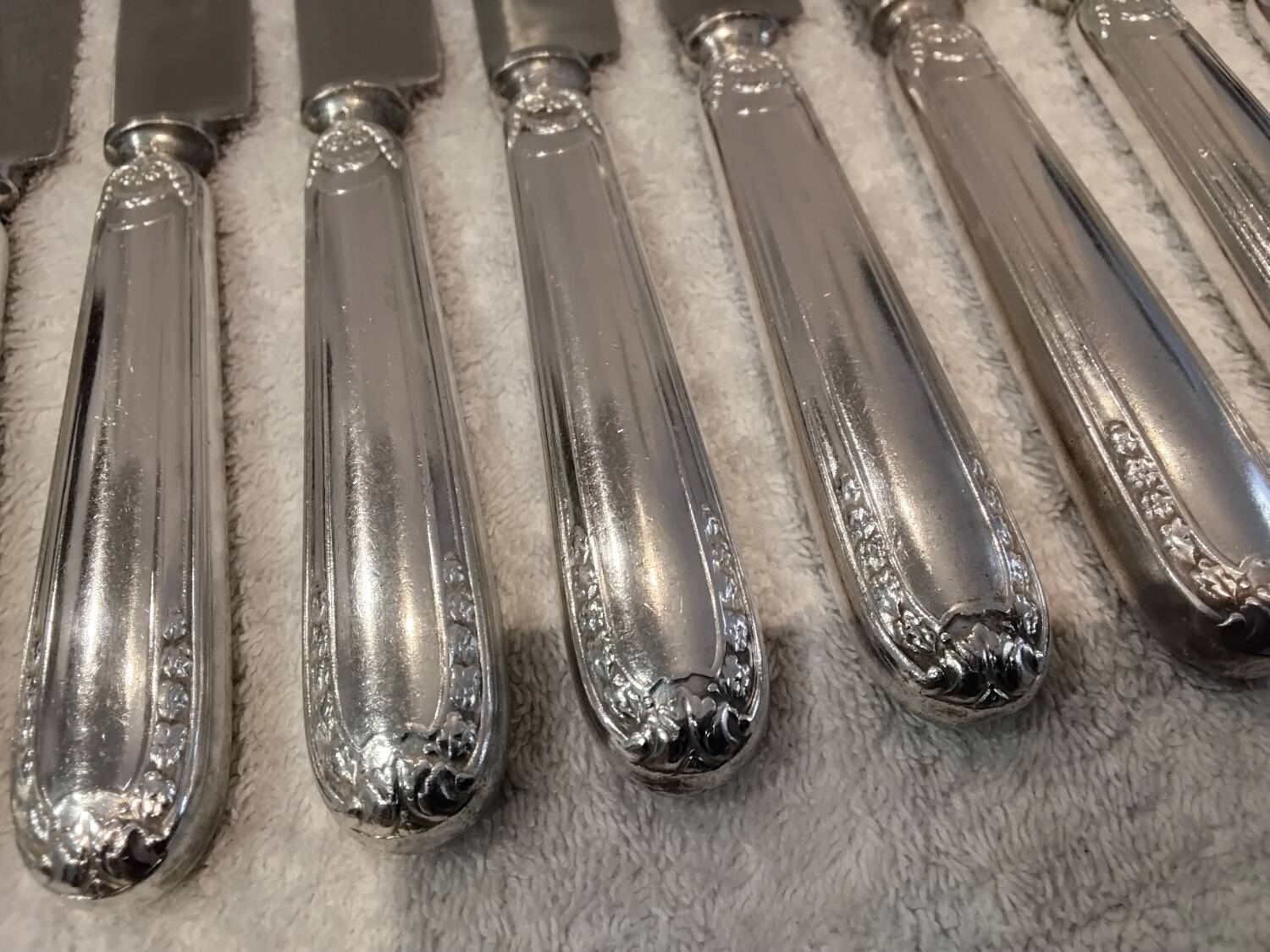 10 silver-plated dessert knives, Empire style, French work?