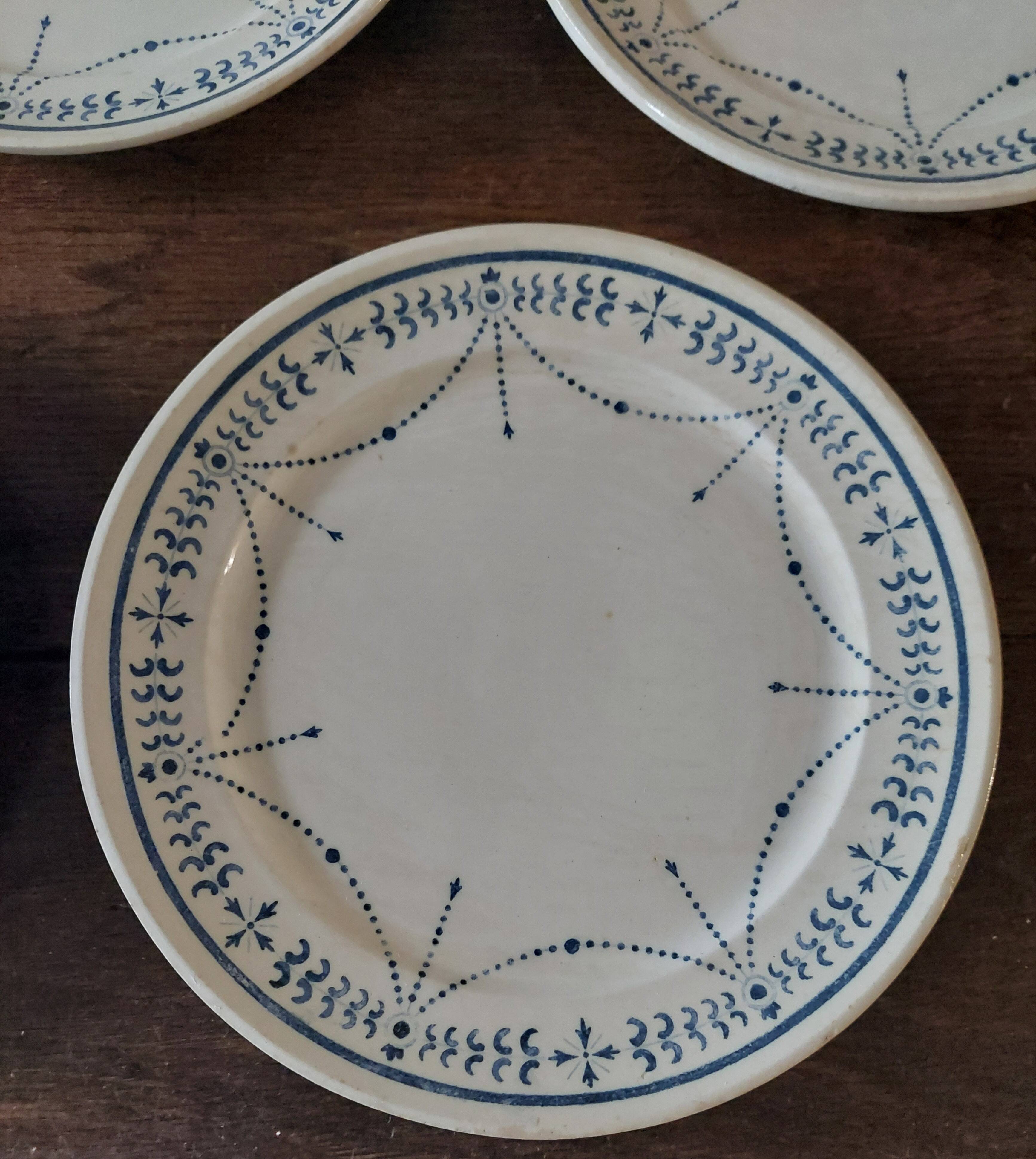 Set of eight flat plates, ironstone, Géon Rouard, Lille decoration, years.