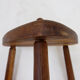Rustic tripod stool with a triangular seat, 1960s.
