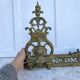 Antique brass fireplace set, bar and andirons, Napoleon I style.