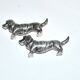 Set of 2 vintage animal knife rests, dachshund and basset hound, in silver-plated metal.