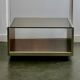 Wood, aluminum and smoked glass coffee table. circa 1970