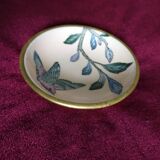 Empty pocket in brass and ceramic bird pattern