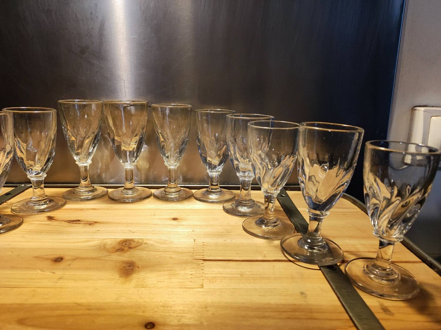 12 small twisted bistro glasses, 19th century
