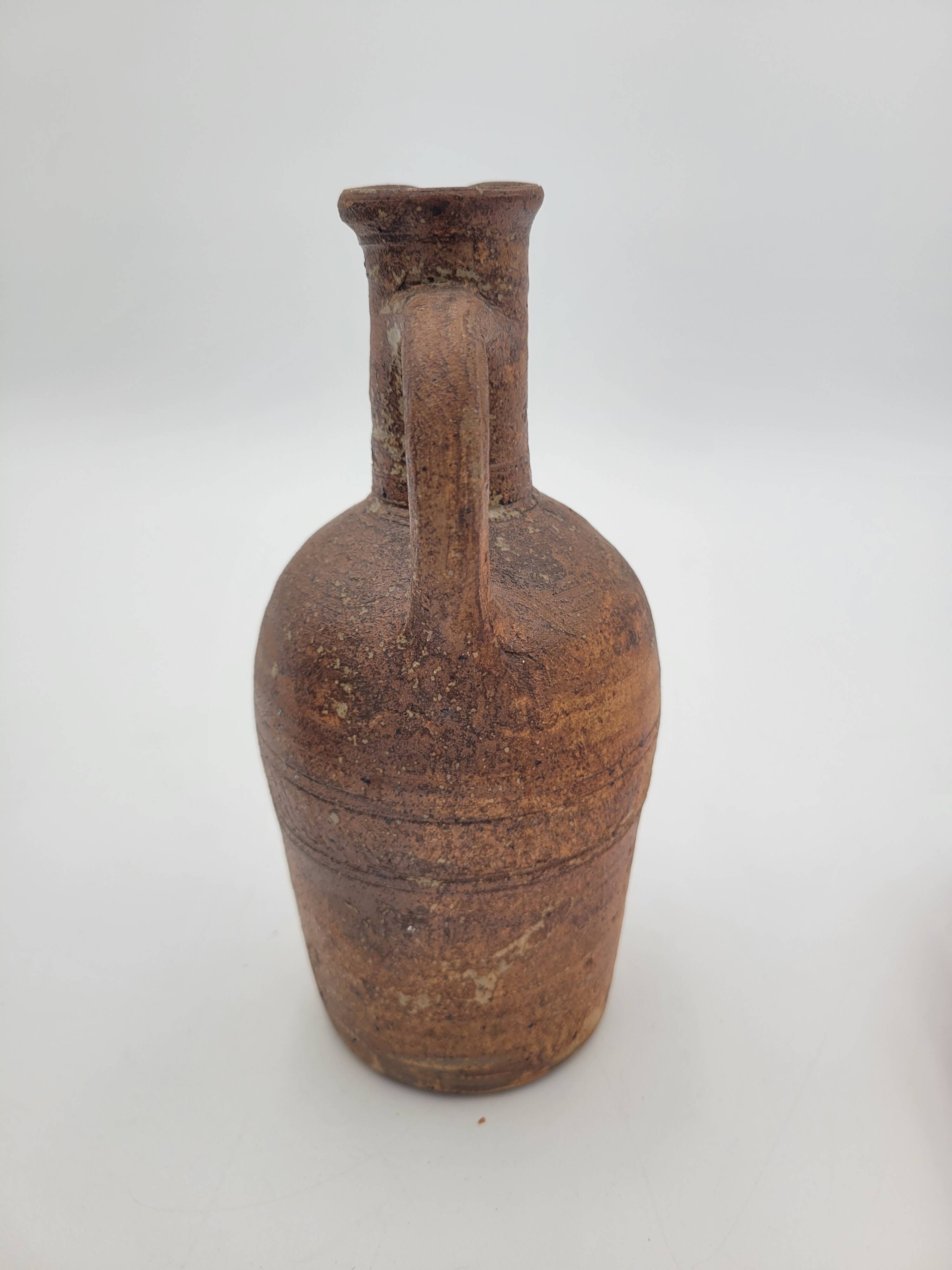 Pair of old terracotta pitchers