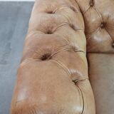 Chesterfield armchair made of cowhide leather in a light cognac colour
