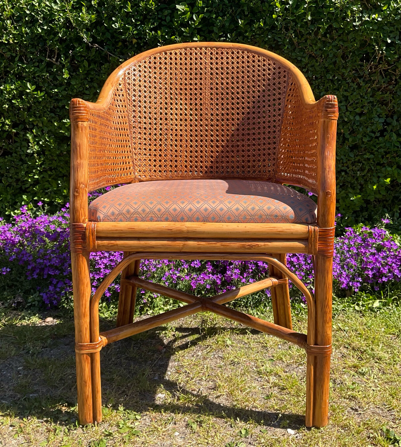 Mc Guire style armchair in rattan and caning from the 1980s.
