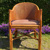 Mc Guire style armchair in rattan and caning from the 1980s.