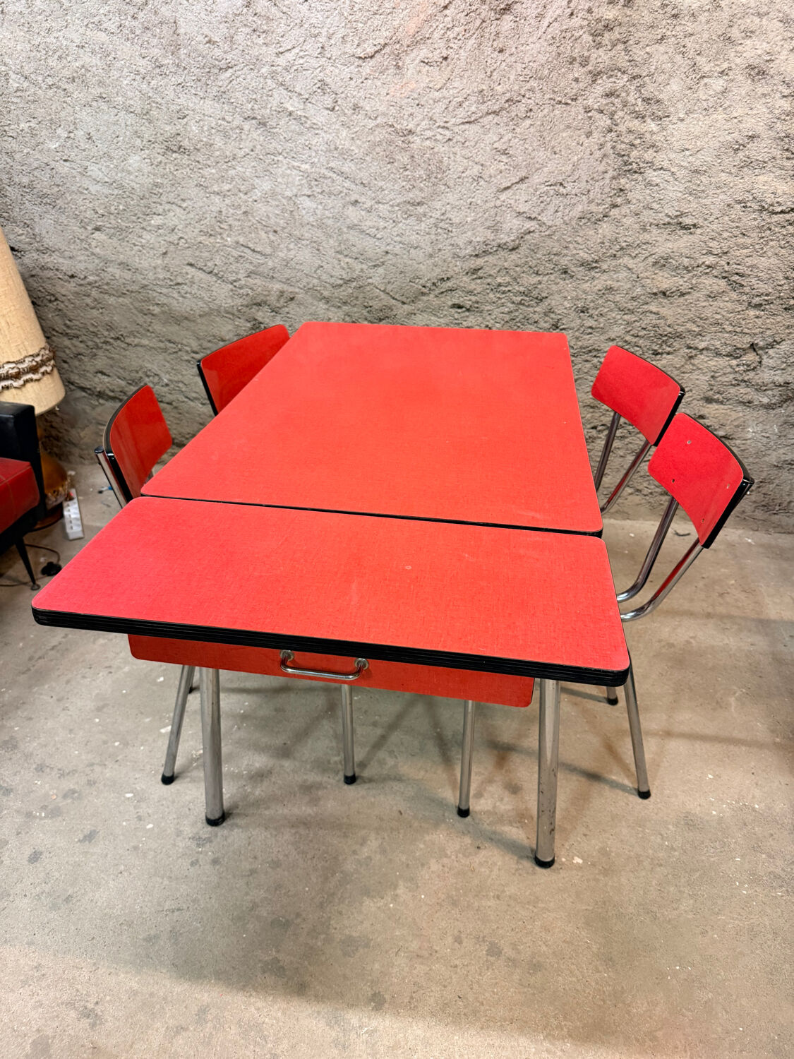 4 red Formica chairs with a 1970s table