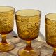 Amber stemmed glasses with vintage fruit decoration - Old brown glasses