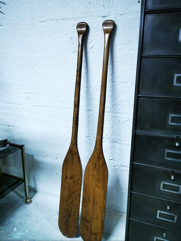 Pair of old wooden oars