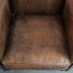 Set of 2 vintage sheepskin armchairs with a characterful appearance