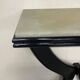 Console from the 1950s in ebonised wood and green marble.