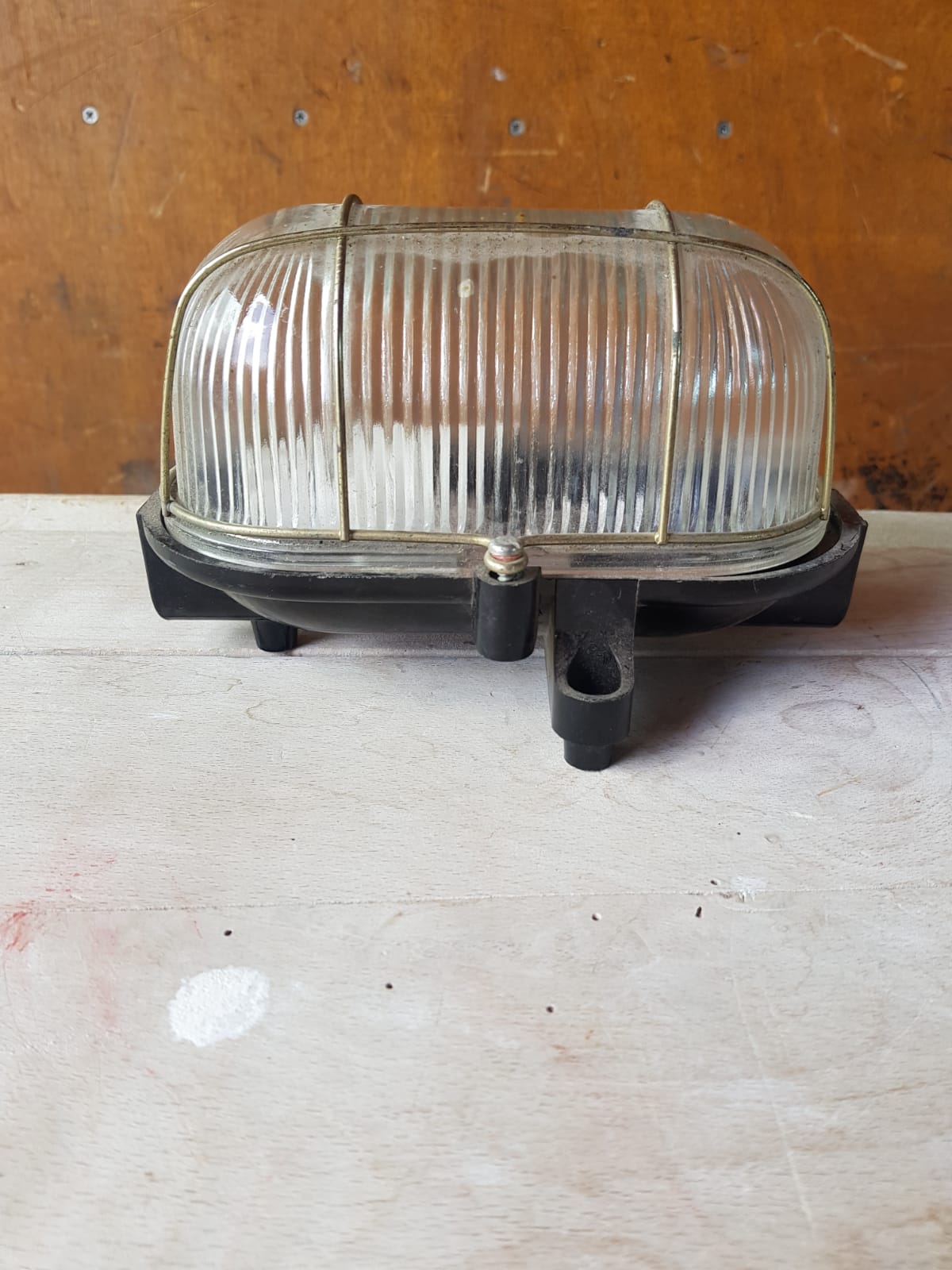 Antique exterior wall light moulded glass & metal grille & black bakelite support