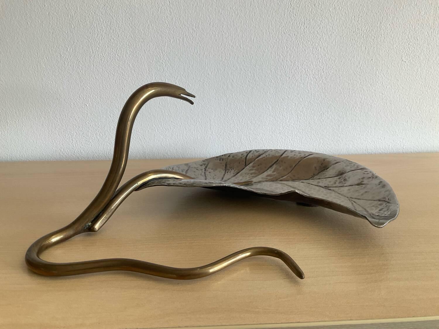 Art Nouveau brass and silver-plated metal pocket emptier