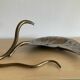 Art Nouveau brass and silver-plated metal pocket emptier