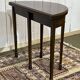 Table à jeux anglaise en acajou du début XXème