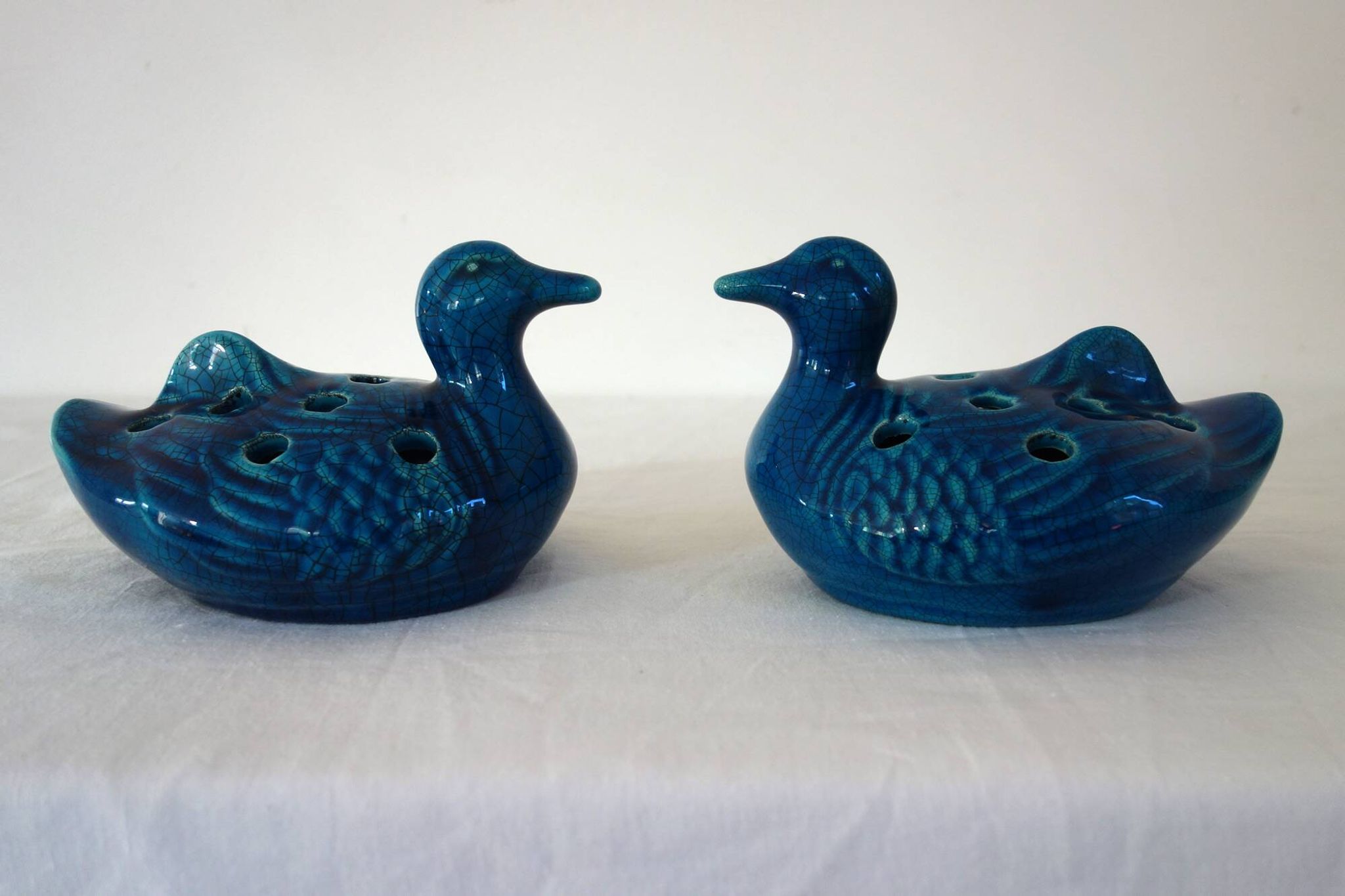 2 blue ceramic duck flower picks