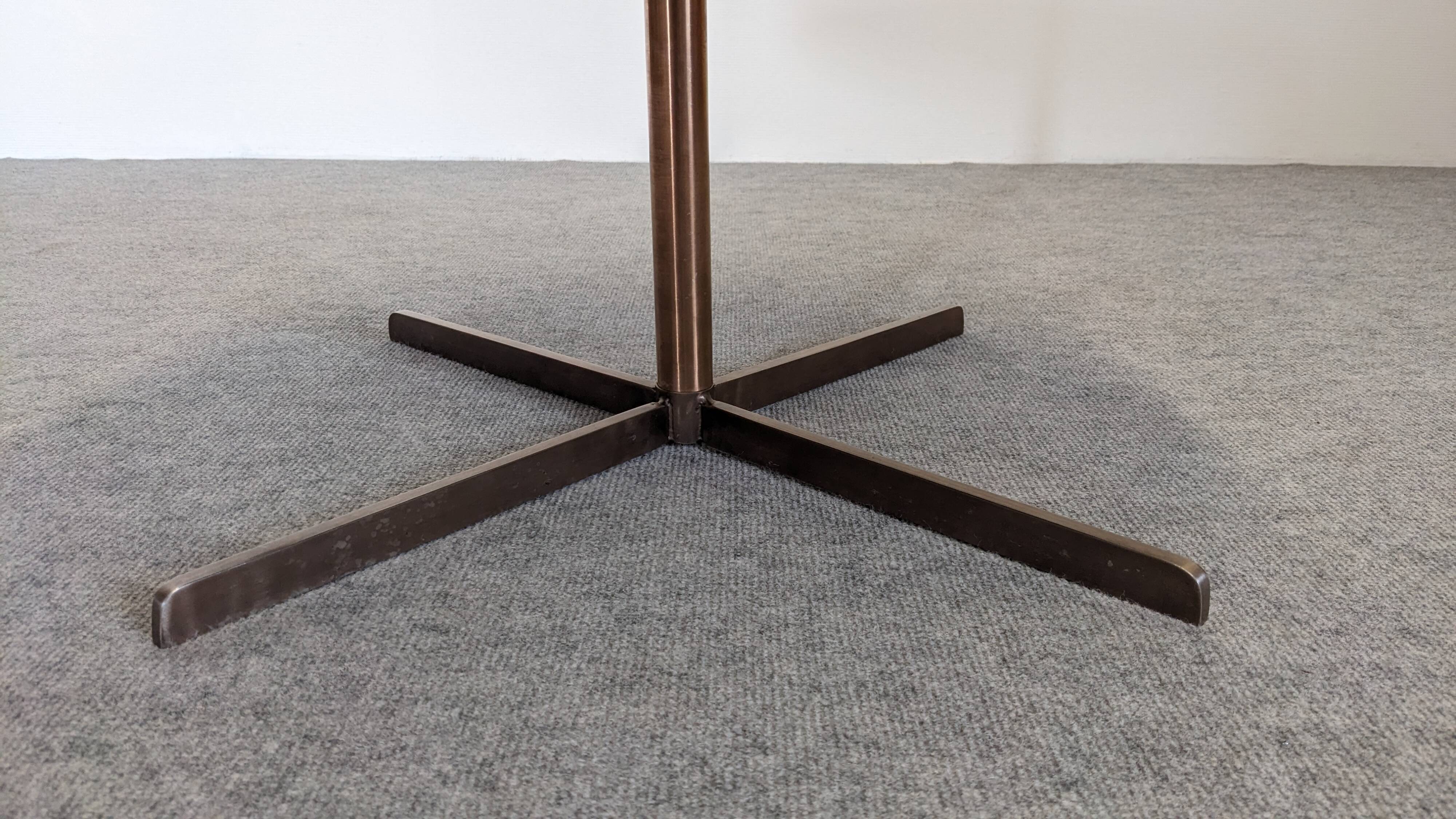 Contemporary round side table or end table.