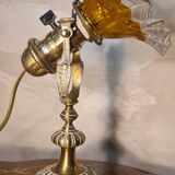 1920 bronze and brass rocking lamp with translucent amber-colored shade