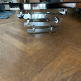 70s design coffee table in rectangular glass with chrome legs.