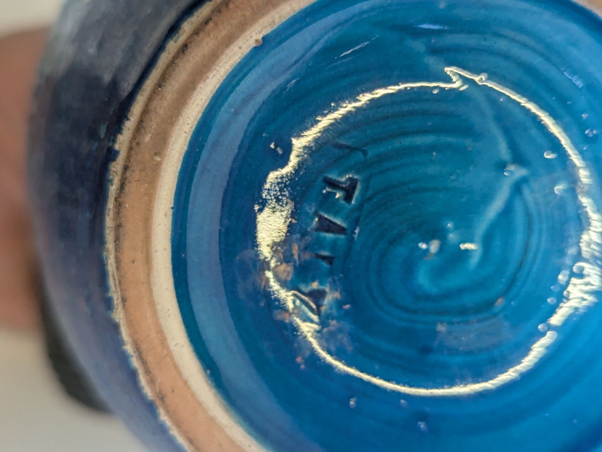 Vintage Italian vase in blue glazed ceramic, relief decoration.