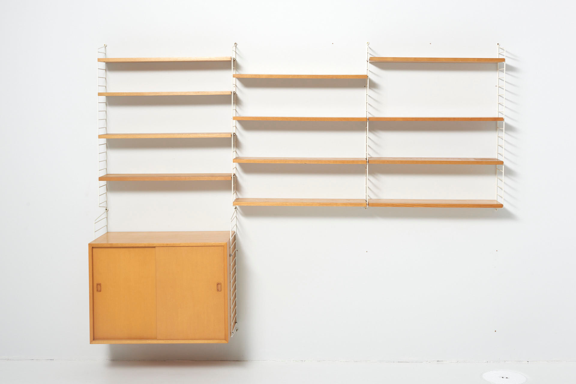 String wall system in ash by Nisse Strinning, Sweden 1950
